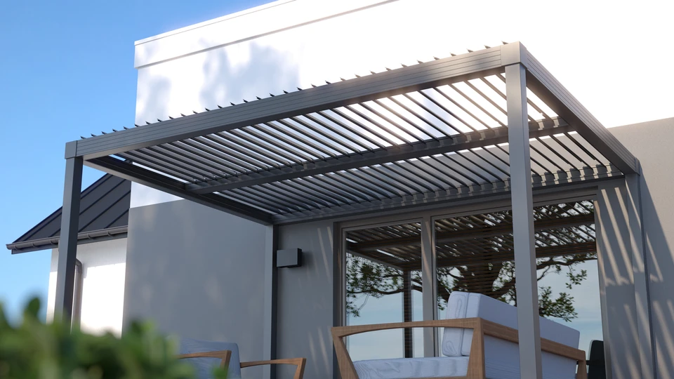 Homme en tenue de travail installant une terrasse extérieure, utilisant un niveau à bulle pour vérifier l'alignement des lambourdes en bois